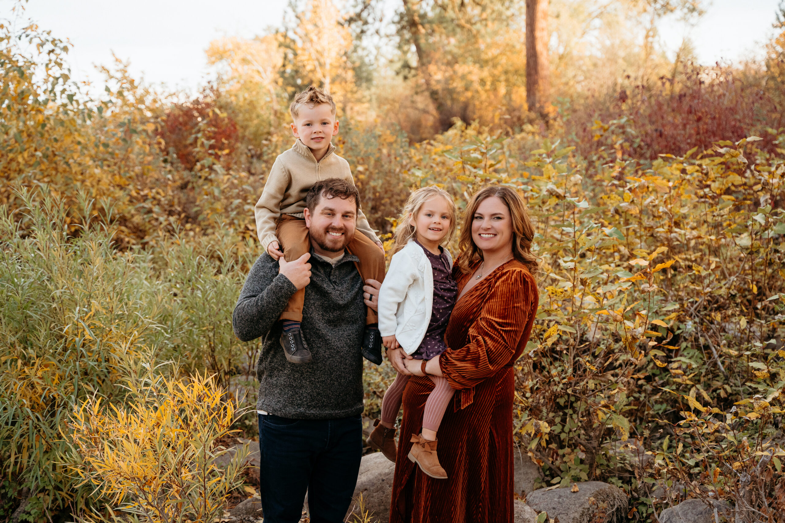 Family Photography Wardrobe Tips | Spokane Family Photographer Family of 4 posing in their family session with Sophie Grace Photography in Spokane WA