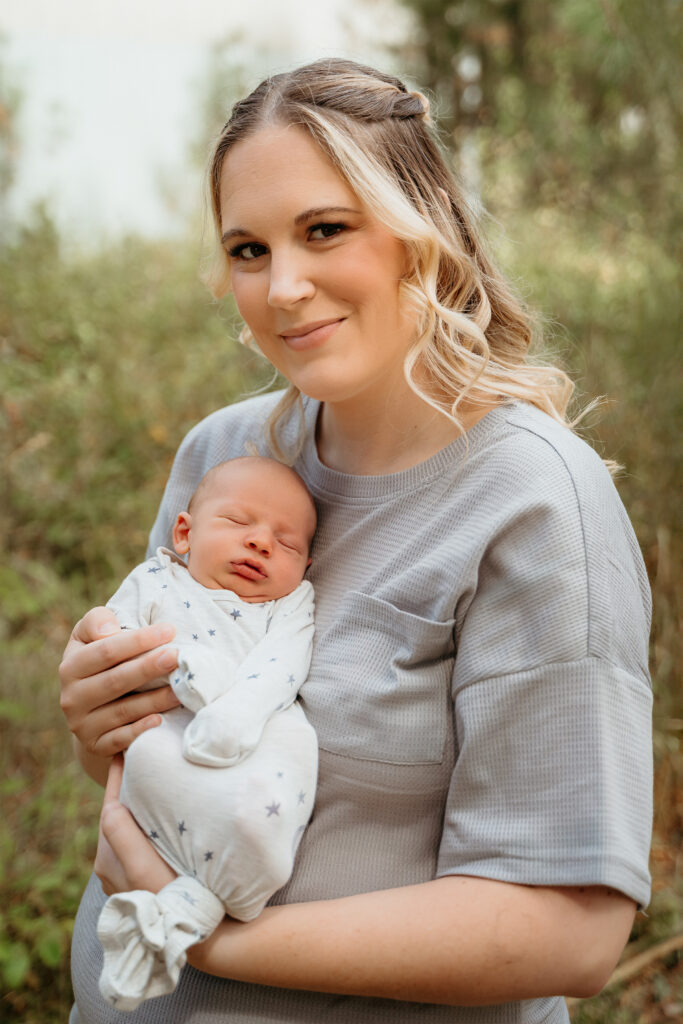 New Parents welcoming their little one during a newborn session with Spokane newborn photographer Sophie Grace Photography
